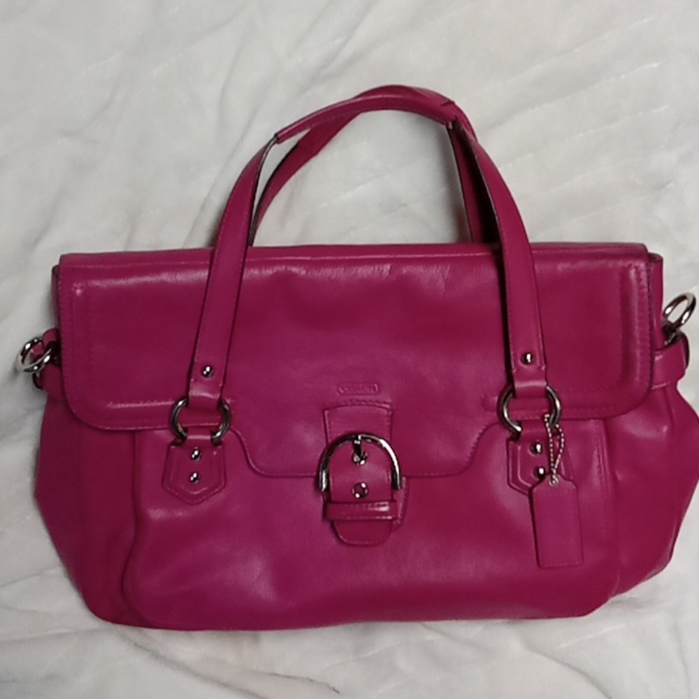 Used one Night coach fuchsia  leather satchel  excellent  condotion